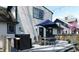 Outdoor deck area featuring a built-in bar and dining set, perfect for relaxation and entertaining at 4815 Carrollton Ave, Indianapolis, IN 46205