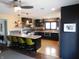 Modern kitchen boasts a large island, stainless steel appliances, and bar seating at 4815 Carrollton Ave, Indianapolis, IN 46205