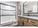 Modern bathroom with a glass-enclosed shower and a stylish vanity with granite countertops at 496 Bridgemont Ln, Carmel, IN 46032