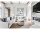 Bright living room with an open layout, featuring comfortable seating and stylish decor at 496 Bridgemont Ln, Carmel, IN 46032