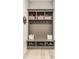 Organized mudroom area features a built-in storage bench, cubbies, and hooks for coats and shoes at 496 Bridgemont Ln, Carmel, IN 46032