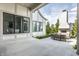 Outdoor patio features cozy seating and an inviting fireplace, perfect for relaxing at 496 Bridgemont Ln, Carmel, IN 46032