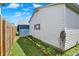 The backyard features a well-maintained lawn and a neat garden bed at 508 Miller Ave, Shelbyville, IN 46176