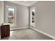 Bedroom featuring two windows and neutral carpeting that fills the entire area at 508 Miller Ave, Shelbyville, IN 46176