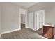 A bedroom with great natural light featuring a dark wood cabinet and carpeting at 508 Miller Ave, Shelbyville, IN 46176