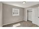 Bedroom with carpet, a closet, and a window to the outside at 508 Miller Ave, Shelbyville, IN 46176