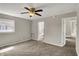 A bedroom with great natural light featuring ceiling fan and a view of the bathroom at 508 Miller Ave, Shelbyville, IN 46176
