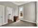 A bedroom with great natural light featuring a dark wood cabinet and carpeting at 508 Miller Ave, Shelbyville, IN 46176