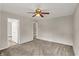 A bedroom with great natural light featuring ceiling fan and a view of another room at 508 Miller Ave, Shelbyville, IN 46176