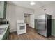 Functional kitchen with neutral tones, featuring wood floors and modern stainless steel appliances at 508 Miller Ave, Shelbyville, IN 46176