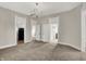 A living room with doorways to other rooms in the house at 508 Miller Ave, Shelbyville, IN 46176
