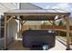 Inviting backyard deck featuring a relaxing hot tub beneath a cozy gazebo at 5236 Skipping Stone Dr, Indianapolis, IN 46237