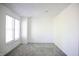 Bright and airy bedroom with neutral carpet, recessed lighting, and a large window at 5236 Skipping Stone Dr, Indianapolis, IN 46237
