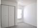 Bedroom featuring neutral gray carpet flooring, a closet, and a window at 5236 Skipping Stone Dr, Indianapolis, IN 46237