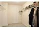 Walk-in closet with wire shelving on the back wall, plus hung clothing at 5236 Skipping Stone Dr, Indianapolis, IN 46237