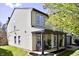 Charming home with a covered porch, neat landscaping, and an attached two-car garage at 5236 Skipping Stone Dr, Indianapolis, IN 46237