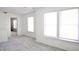 Hallway with neutral carpet and ample natural light at 5236 Skipping Stone Dr, Indianapolis, IN 46237