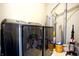 Functional laundry area with modern washer and dryer, plus extra storage solutions at 5236 Skipping Stone Dr, Indianapolis, IN 46237