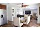 Open concept living room and kitchen area, perfect for entertaining, with fireplace and TV at 5236 Skipping Stone Dr, Indianapolis, IN 46237
