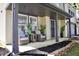 Charming covered front porch with seating area, offering a cozy spot to relax and enjoy the outdoors at 5236 Skipping Stone Dr, Indianapolis, IN 46237