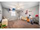 Spacious bedroom with neutral tones, window and a variety of decor at 5500 W Sudbury Dr, Muncie, IN 47304