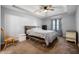 Neutral toned bedroom with fan and closet, and lots of natural light at 5500 W Sudbury Dr, Muncie, IN 47304