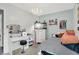 This is a cozy bedroom features stylish decor, including a vanity, and a window for natural light at 5595 Auburndale Dr, Bargersville, IN 46106