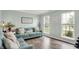 Inviting living room featuring neutral decor, plush seating, and ample natural light at 5595 Auburndale Dr, Bargersville, IN 46106