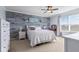Bedroom with accent wall, carpet, fan and dresser at 621 Sonoma Ln, Greenfield, IN 46140