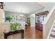 Inviting dining area featuring warm lighting and access to staircase at 621 Sonoma Ln, Greenfield, IN 46140