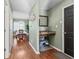 Entryway with shoe storage and view of dining room and kitchen at 621 Sonoma Ln, Greenfield, IN 46140