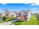 Charming two-story home with well-manicured lawn, mature trees, and inviting curb appeal at 621 Sonoma Ln, Greenfield, IN 46140