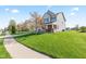 Well-maintained home featuring a lush green lawn and inviting neighborhood street at 621 Sonoma Ln, Greenfield, IN 46140
