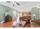 Bright living room with hardwood floors and open access to kitchen at 621 Sonoma Ln, Greenfield, IN 46140