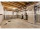 Unfinished basement with concrete floor, insulated walls, and water equipment ready for customization at 6408 Askin Dr, Indianapolis, IN 46259