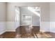 Inviting living room featuring hardwood floors and modern trim at 6408 Askin Dr, Indianapolis, IN 46259