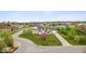 Aerial shot of stunning home with expansive lawn and mature trees in a great neighborhood at 6519 Rothchild Blvd, Indianapolis, IN 46278