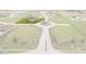 Aerial view showcases a perfectly situated home on a manicured corner lot with mature trees and landscaping at 6519 Rothchild Blvd, Indianapolis, IN 46278