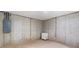 Unfinished basement room with concrete walls and a small cabinet at 6519 Rothchild Blvd, Indianapolis, IN 46278