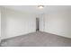 Carpeted bedroom with two doorways and neutral paint throughout at 6519 Rothchild Blvd, Indianapolis, IN 46278
