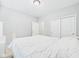 Bright bedroom featuring neutral walls, plush carpeting, and ample closet space at 6606 Colt Ln, Anderson, IN 46013