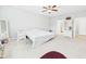 Spacious bedroom features neutral carpeting, large windows and ensuite access at 6606 Colt Ln, Anderson, IN 46013