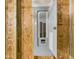 Close-up of electrical panel and interior wall construction at 6606 Colt Ln, Anderson, IN 46013