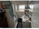 Standard bathroom with white vanity, bath tub, and shower at 712 E Mckenzie Rd, Greenfield, IN 46140