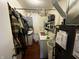 A compact laundry room and utility space with practical appliances at 712 E Mckenzie Rd, Greenfield, IN 46140