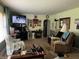 Inviting living room features comfortable seating and an entertainment center at 712 E Mckenzie Rd, Greenfield, IN 46140
