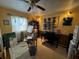 Inviting music room featuring a piano and art display, blending creativity and comfort at 712 E Mckenzie Rd, Greenfield, IN 46140