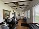 Bright sunroom with natural light and hardwood floors, ideal for relaxing or hobbies at 712 E Mckenzie Rd, Greenfield, IN 46140