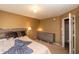 Neutral toned bedroom with queen size bed, dresser, and side tables at 717 Driftwood Cir, Danville, IN 46122