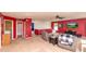 Large bonus room with carpeting, ceiling fan, and comfortable furniture at 717 Driftwood Cir, Danville, IN 46122